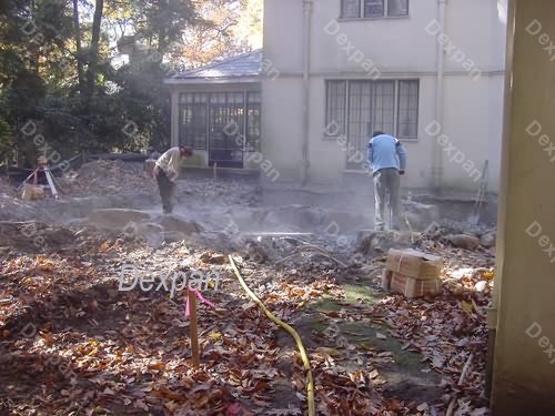 Dexpan Proyecto de excavacin y demolicin de rocas en el patio de una casa